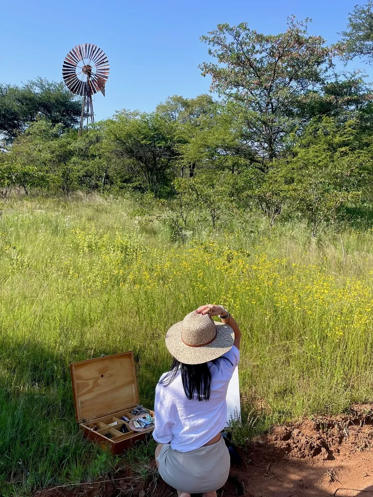 Plein-air painting session on the Zebra Hills deck